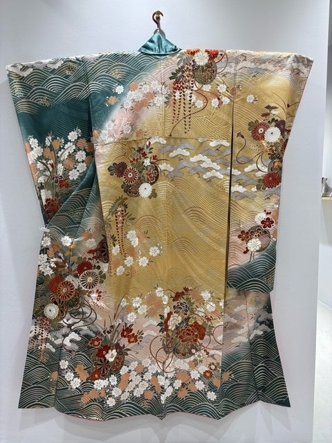 Furisode (long-sleeved kimono) in light green with a floral cart and wave pattern, featuring gold thread and gold embroidery [4570191714766]