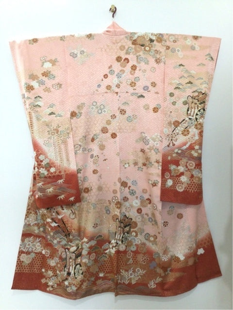 Furisode (long-sleeved kimono) in pink and orange, featuring a court carriage, chrysanthemums, and wisteria. [4570191655342]