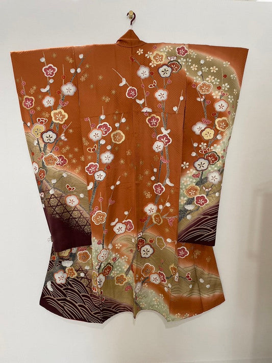 Furisode (long-sleeved kimono) in orange with plum blossom, cherry blossom, and wave pattern [4570191656189]